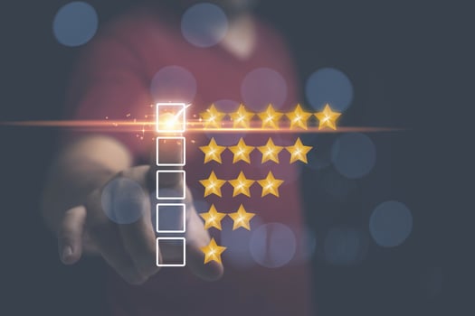 Customer review feedback survey, satisfaction ranking high. A man give rating to service experience on online application. Customer can evaluate of service leading to reputation ranking of business. photo