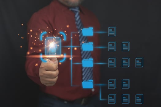 Document Management System. Businessman touching icon virtual online. Database and process automation to manage files, knowledge, and documentation in the company. photo
