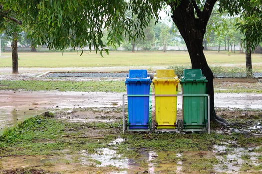 trash bin in the park on a rainy day photo