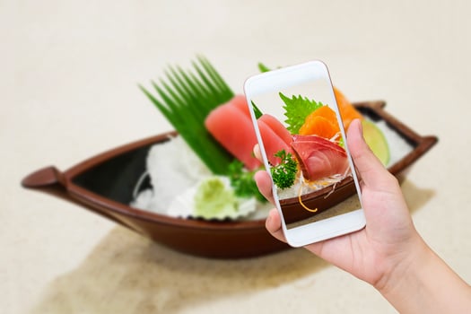 Japanese sashimi sushi set on sushi boat plate photo