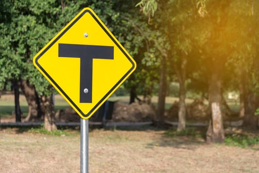 Traffic sign alert for crossroad ahead photo
