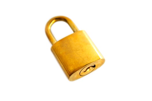 golden padlock isolated on white background photo