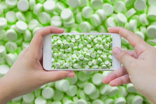 taking photo of medicine pills