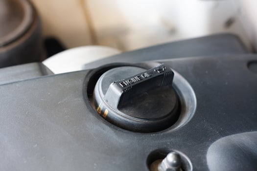 closeup engine oil cap in engine room photo