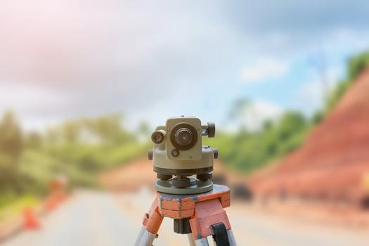 road construction site, theodolite instrument for road construction photo
