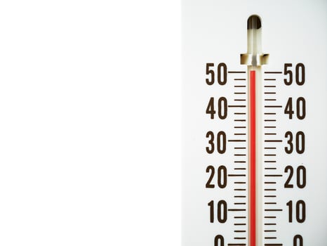 Closeup thermometer showing temperature in degrees Celsius photo