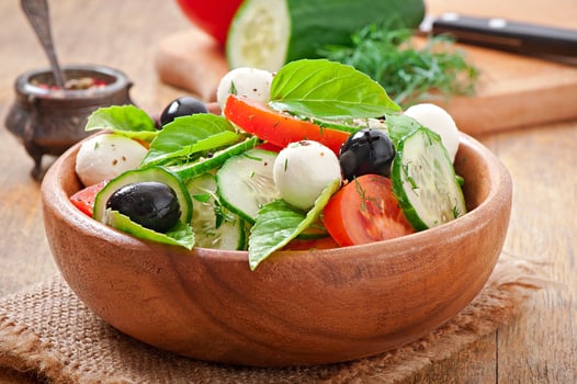 Fresh vegetable greek salad, close up photo