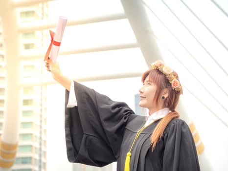 Woman portrait smiling and happy on her graduation day photo