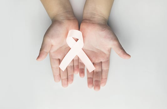 Child holding white ribbon. violence against children and women photo