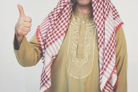 Arab businessman showing thumb photo