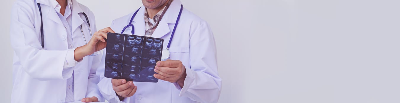 Doctors holding a clipboard with prescription photo