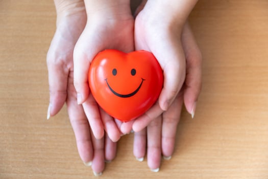 mother and daughter hands holding red heart, health care, donate and family insurance concept photo