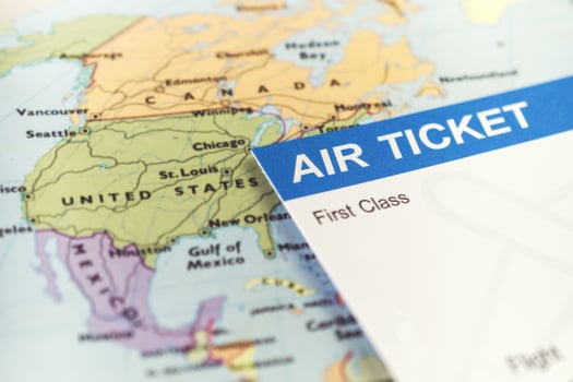 Air Ticket and passports on the map, flight to america, travel concept photo