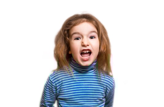 A small Caucasian girl in a blue striped turtleneck opened her mouth in indignation and twisted her face, wrinkling her nose. Denial, unpleasant, outrage, phew, disgusting. White background, isolate photo