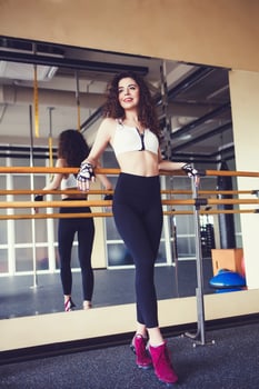 slim sporty woman in sports clothes photo