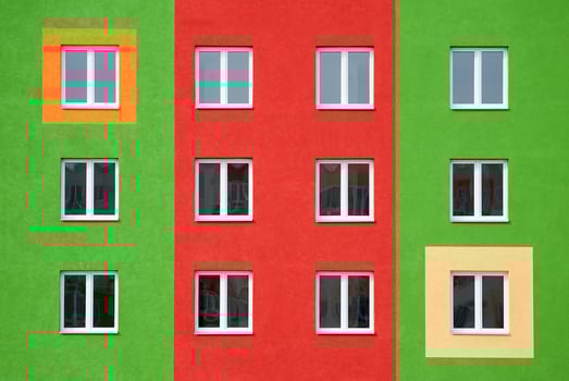 Bright facade, residential building with large Windows photo