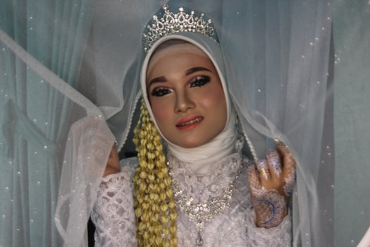 Beautiful Indonesian Muslim bride. photo