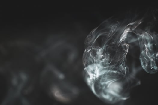 abstract background of smoke or fog on black background photo