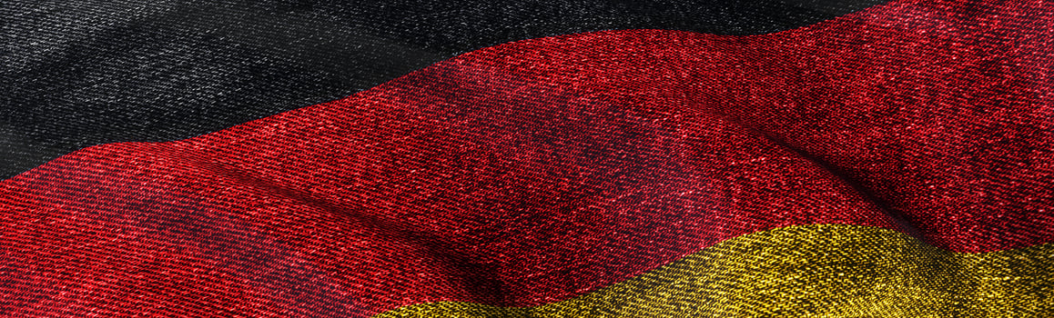 Close of grunge German flag. photo