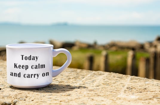 Motivational and Inspirational quote on a white coffee cup photo