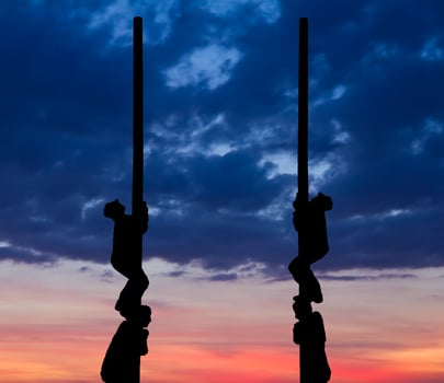 Silhouette pole climbing photo
