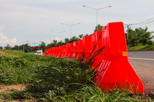 Barrier orange plastic grass road photo