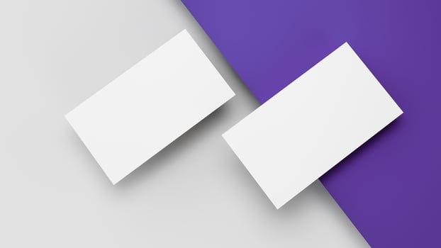 Two white US business card Mockup laying on blue and grey background. card front and back laying on colored surface 3D Illustration photo