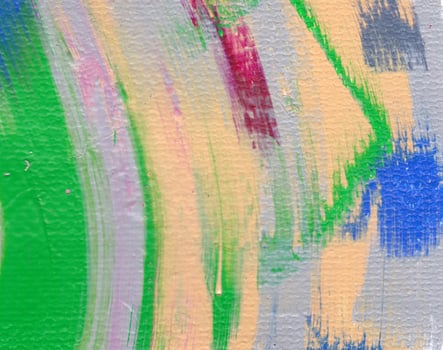 Artist's palette with mixed oil paints, macro, colorful stroke texture on canvas, abstract art background photo