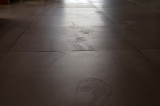 Foot print on dirty floor. photo