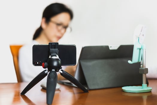 Woman working online preparing  broadcasting live in home office. photo