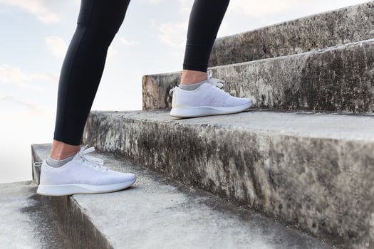 Woman exercise walking up the stairs burn fat, Healthy lifestyle concept. photo