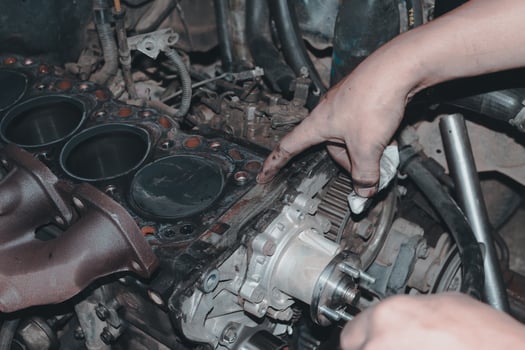 The mechanic is checking the engine. photo