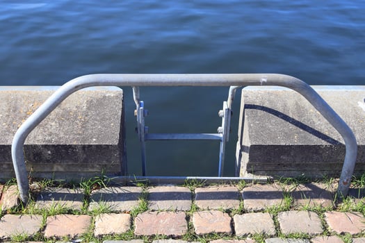 Different bollards and technical installations of vessel traffic at a port photo