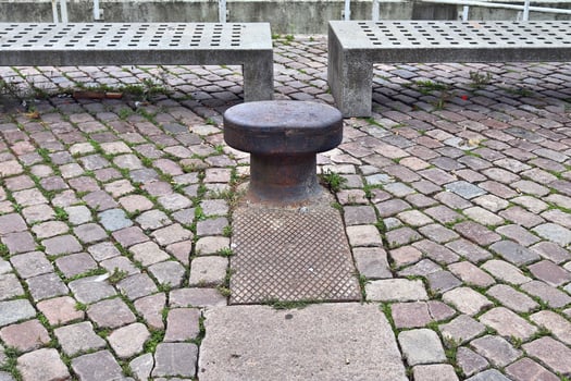 Different bollards and technical installations of vessel traffic at a port photo
