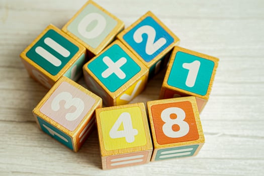Number wood block cubes for learning Mathematic, education math concept. photo