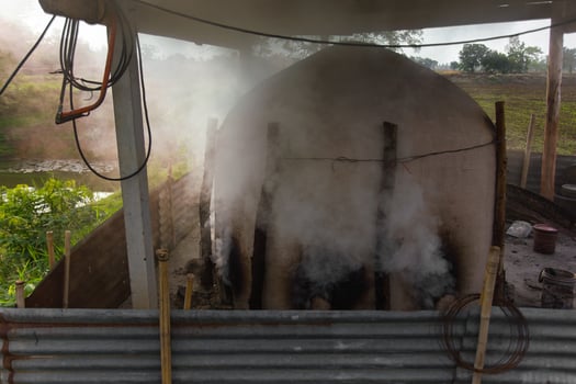 Smoke from charcoal clay oven.. photo