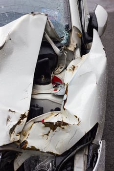 Close-up white car accident. photo