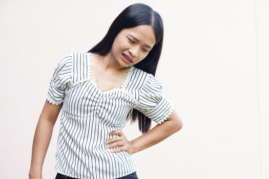 Woman suffer from stomachacheChronic gastritis Abdomen bloating concept photo