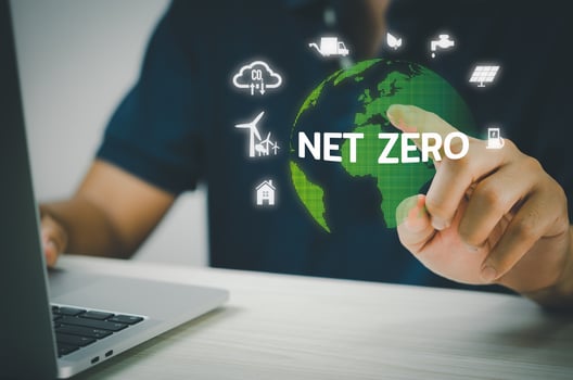 Man hand virtual world icon. NET ZERO icons and symbols save the eco world and reduce pollution virtual screen. Business eco concept. photo