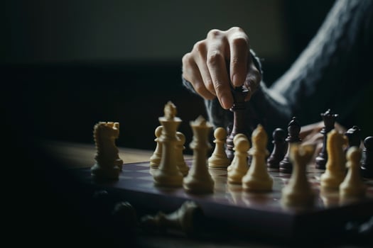 Close up shot hand of young woman playing chess for business challenge competition winner concept photo
