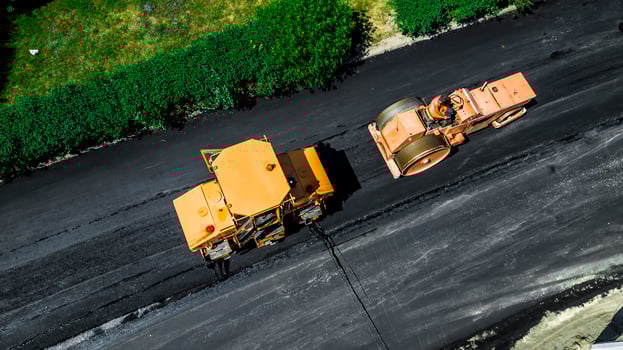 Aerial view on the new asphalt road under construction photo