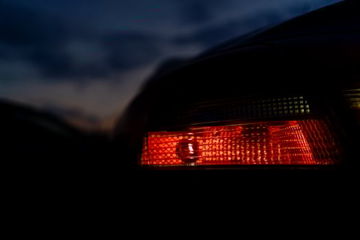 car tail light at night close up photo
