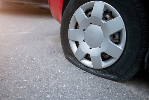the punched wheel of the car close-up photo