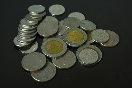 Thailand coin money on black background photo