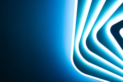 Abstraction, banner background. Blue bright light from a light bulb. photo
