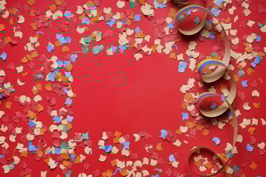 confetti and paper streamer background frame photo