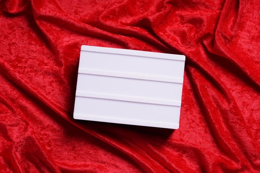 lightbox on red velvet background photo