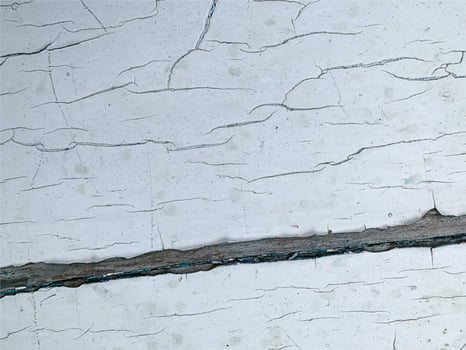 Wooden wall with weathered paint texture photo
