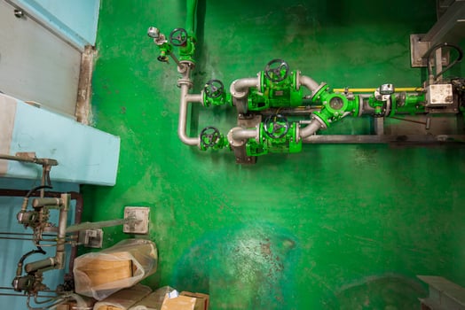 Green pipeline and valve equipment for water supply system control room photo