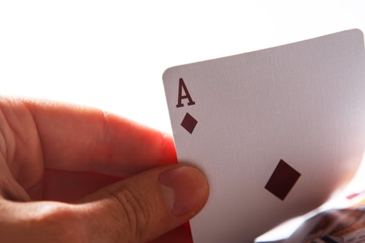 Holding ace in hand photo